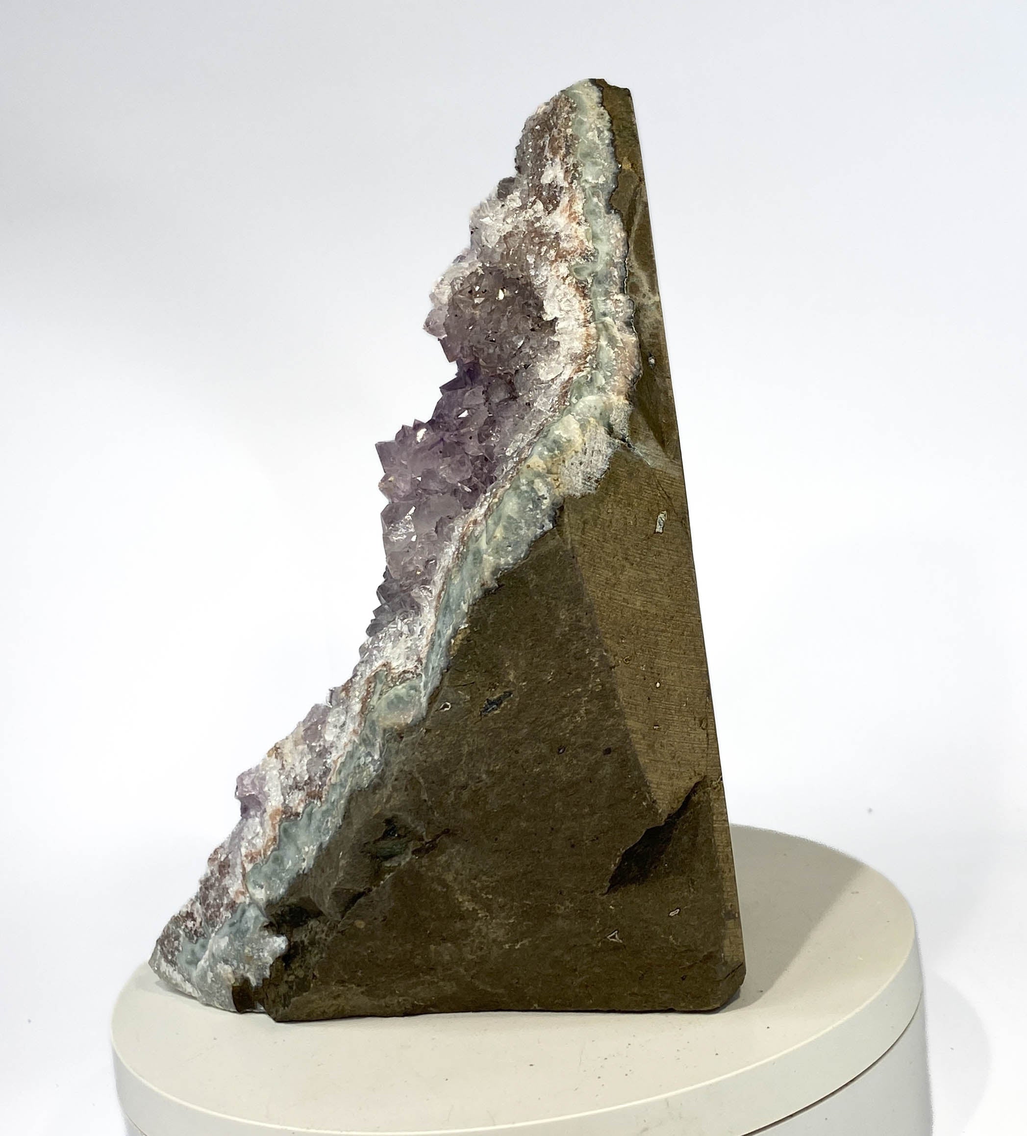 Uruguay amethyst geode with stalactite bumps and lavender crystal flowers