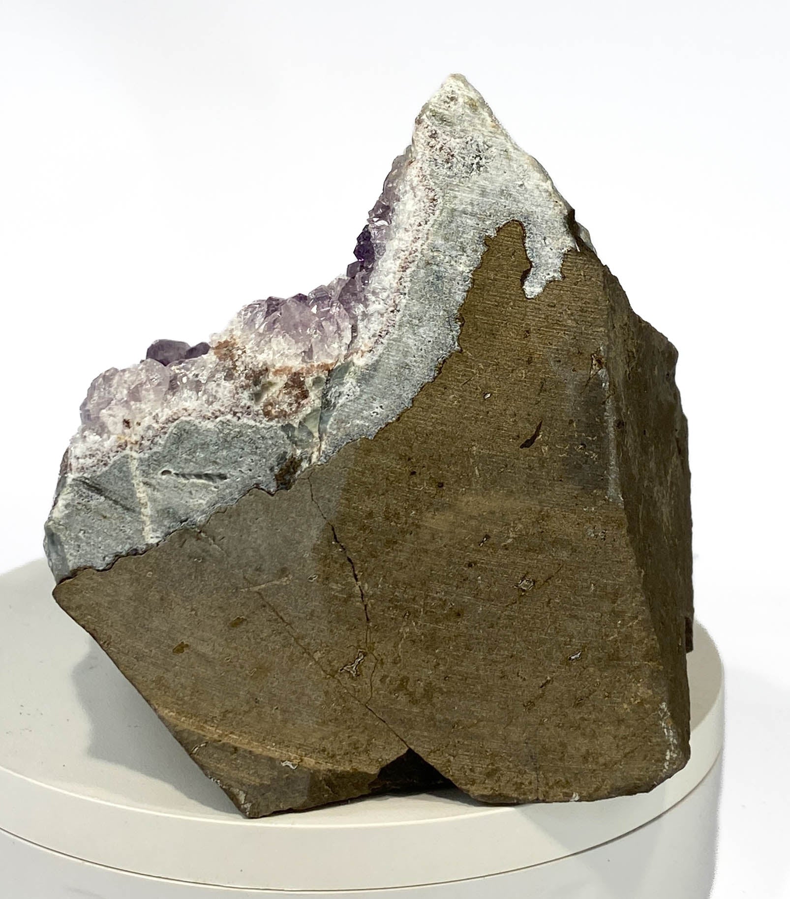 Uruguay amethyst geode with stalactite bumps and lavender crystal flowers