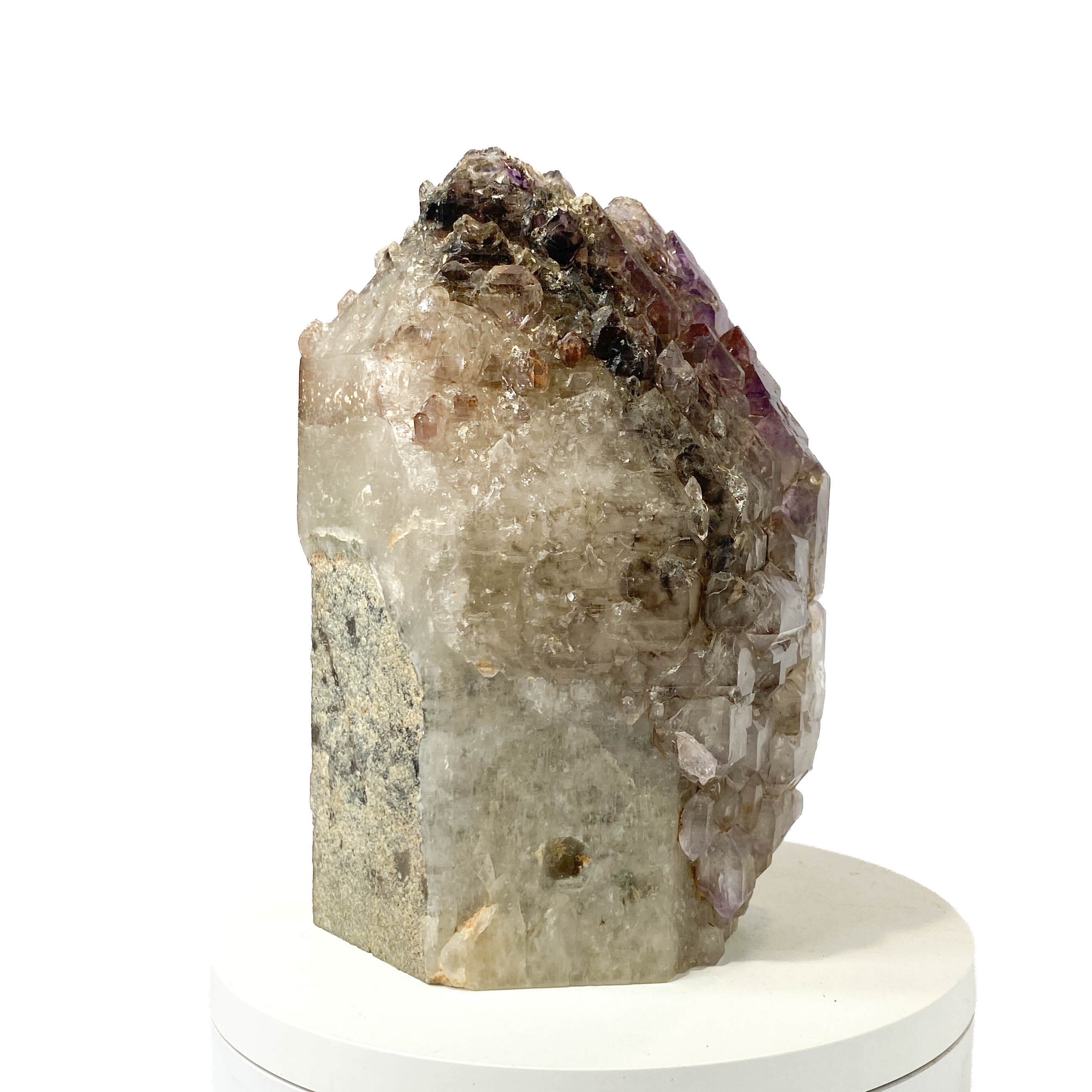 Montana amethyst standing crystal with jacaré elestial formation on white background