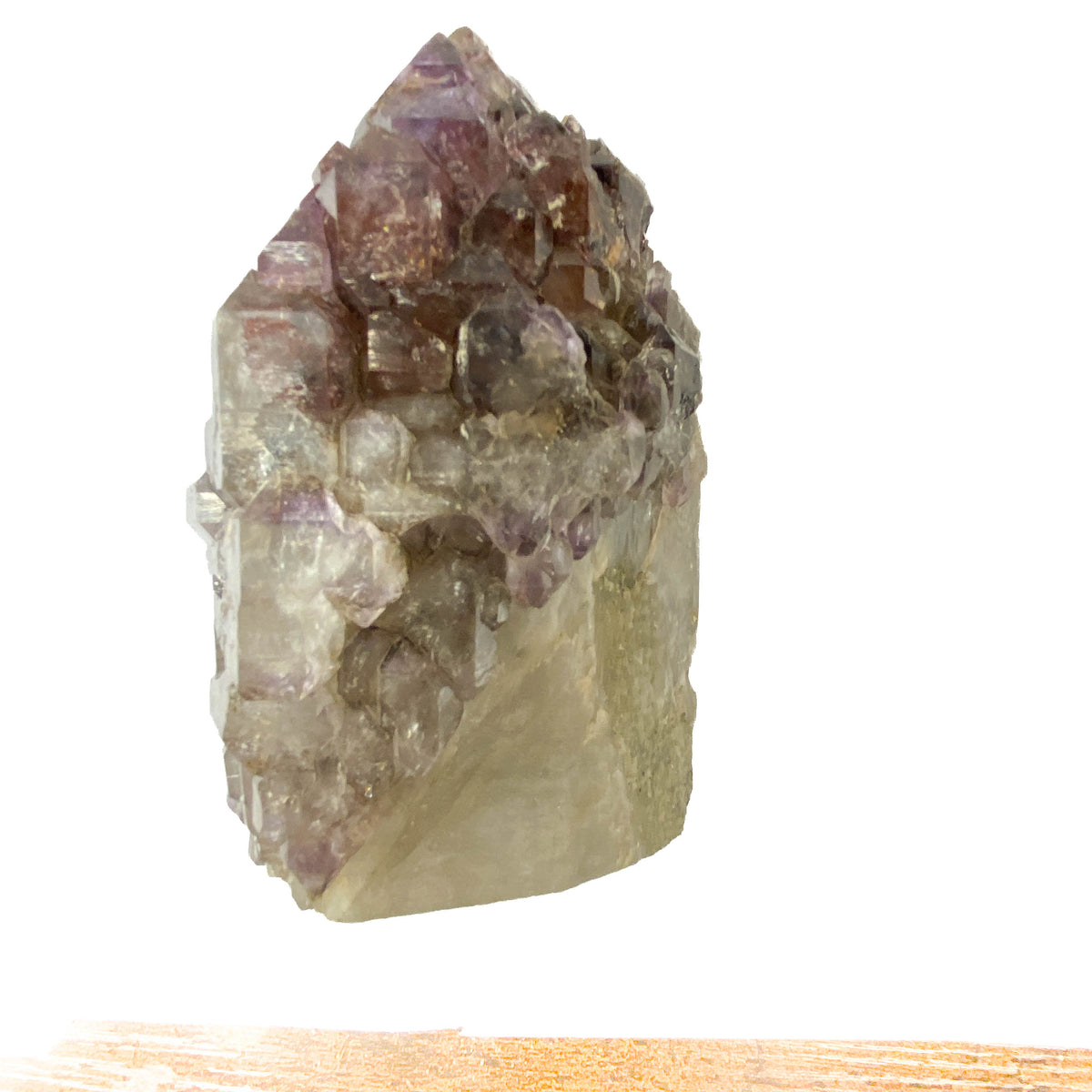 Montana amethyst standing crystal with jacaré elestial formation on white background