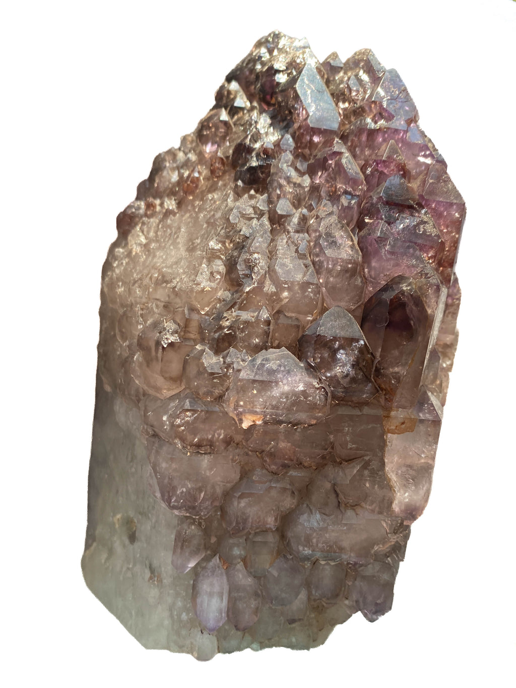 Montana amethyst standing crystal with jacaré elestial formation on white background