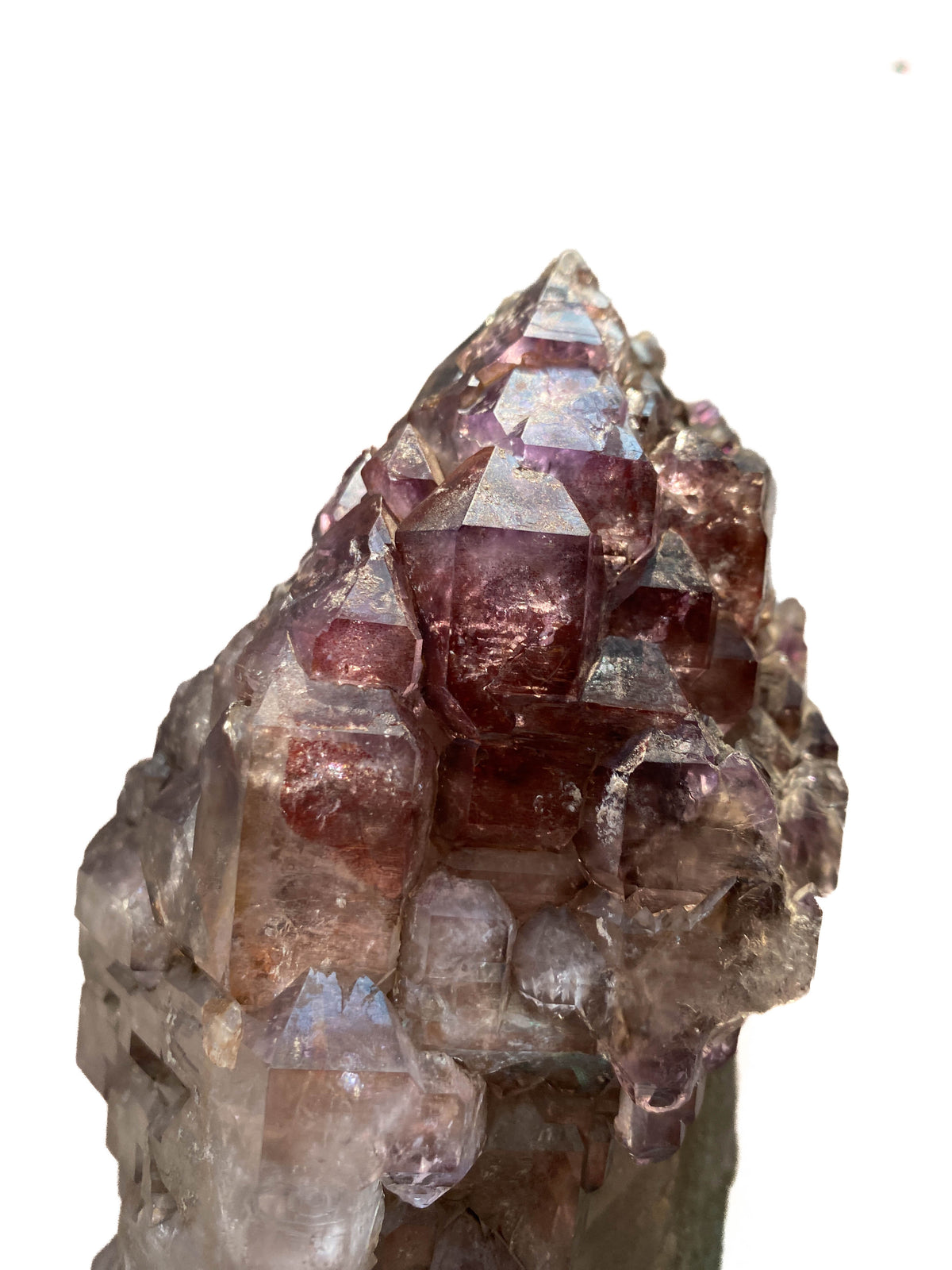 Montana amethyst standing crystal with jacaré elestial formation on white background