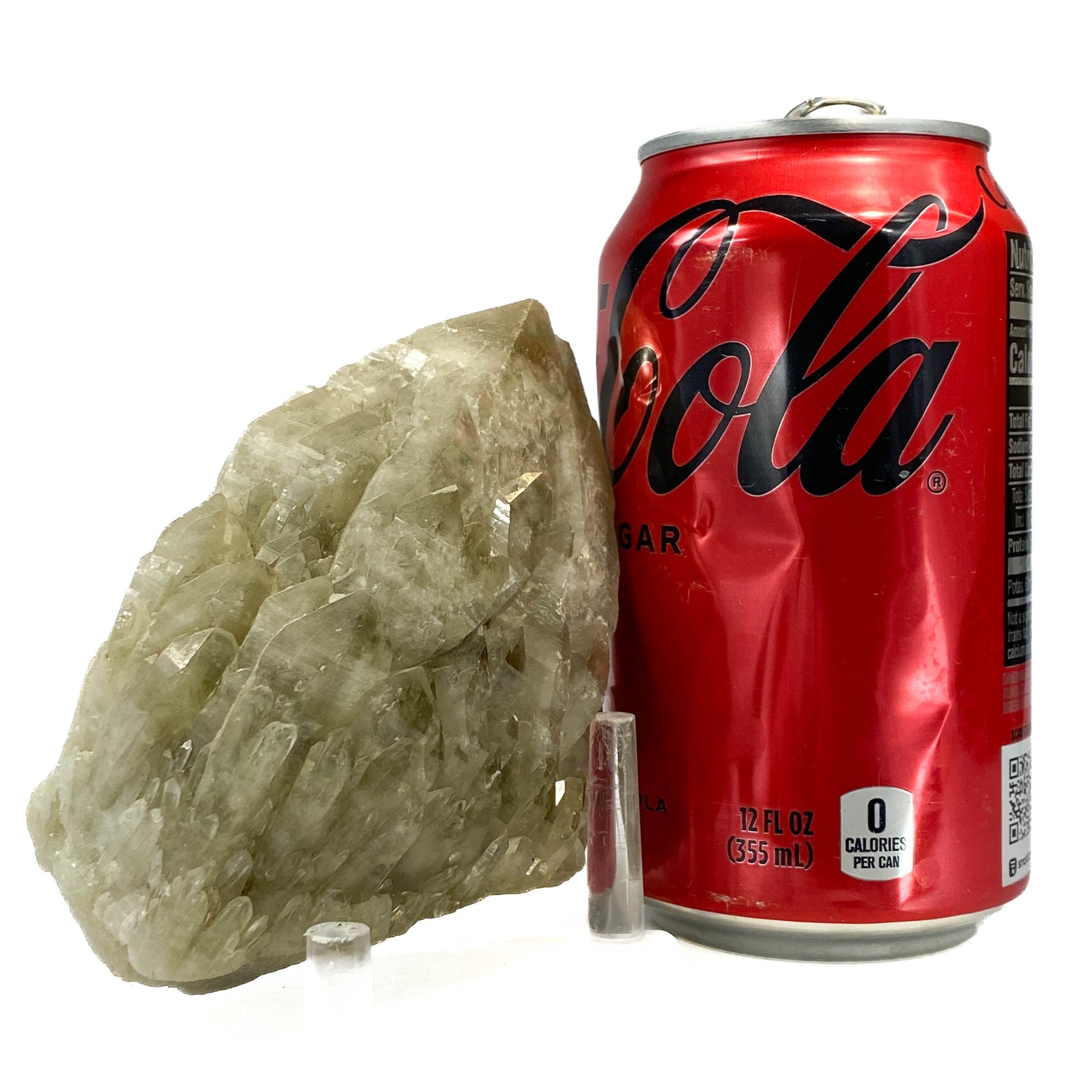 Elestial smoky citrine candle quartz point shown next to a soda can for size reference