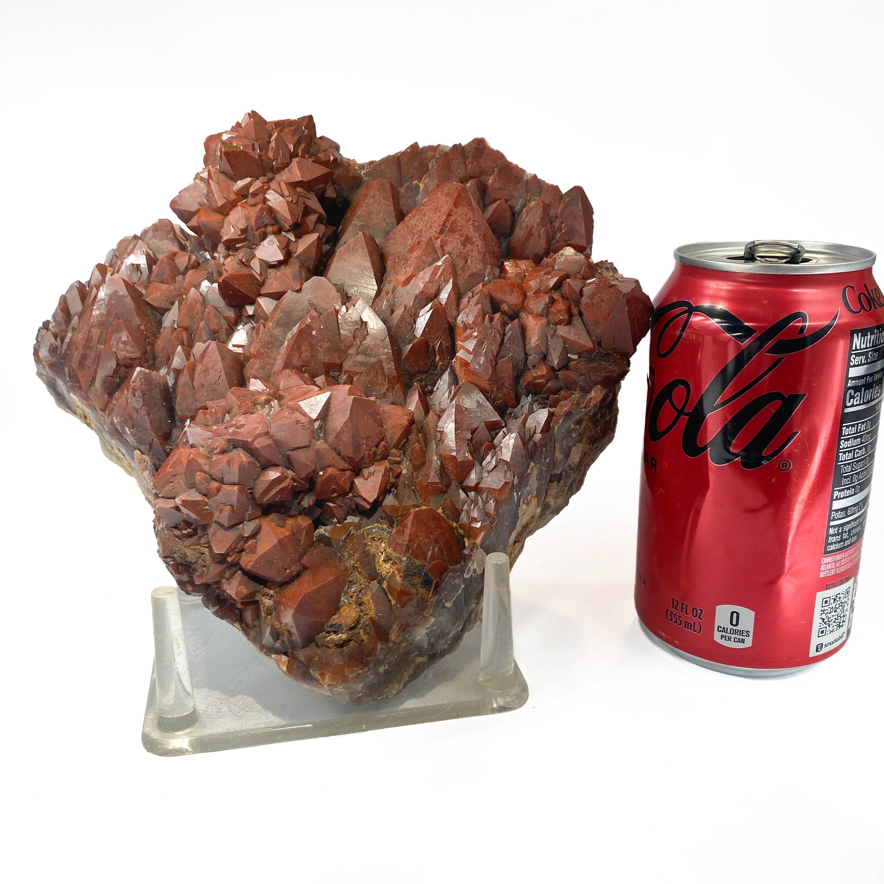 Red hematoid quartz cluster with sharp crystal points, Thunder Bay Ontario, a soda can for scale
