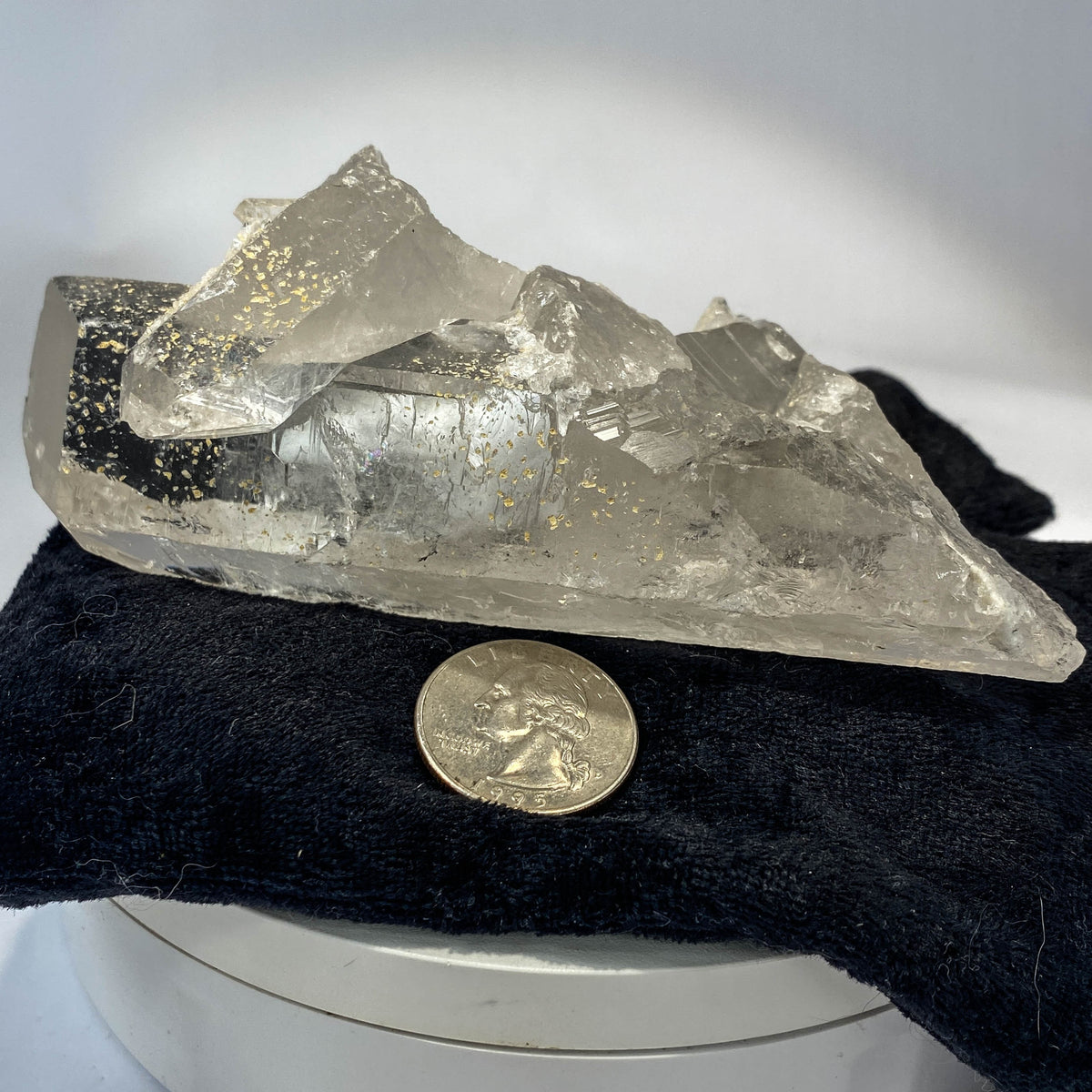 Waterclear quartz crystalline aggregate cluster on white background
