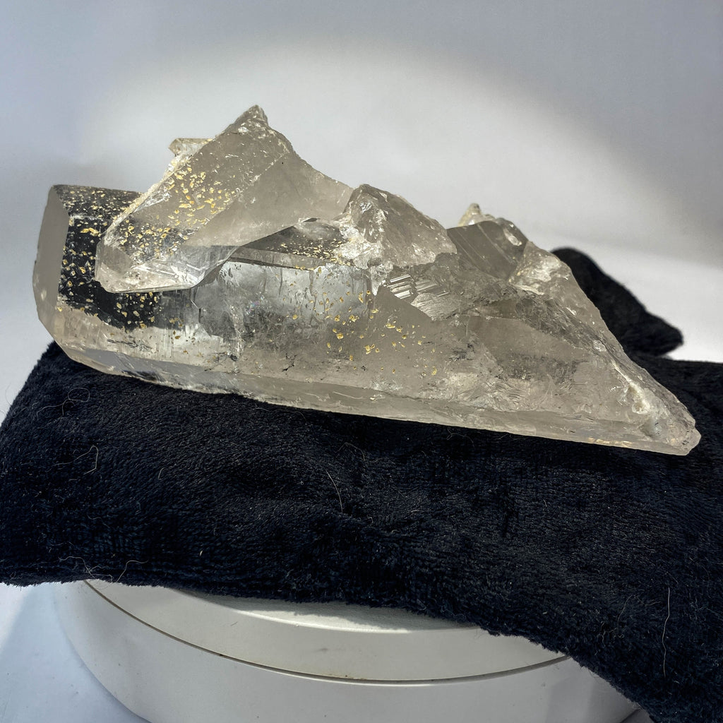 Waterclear quartz crystalline aggregate cluster on white background
