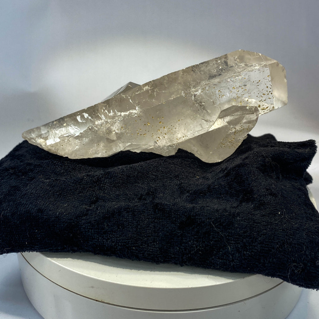 Waterclear quartz crystalline aggregate cluster on white background