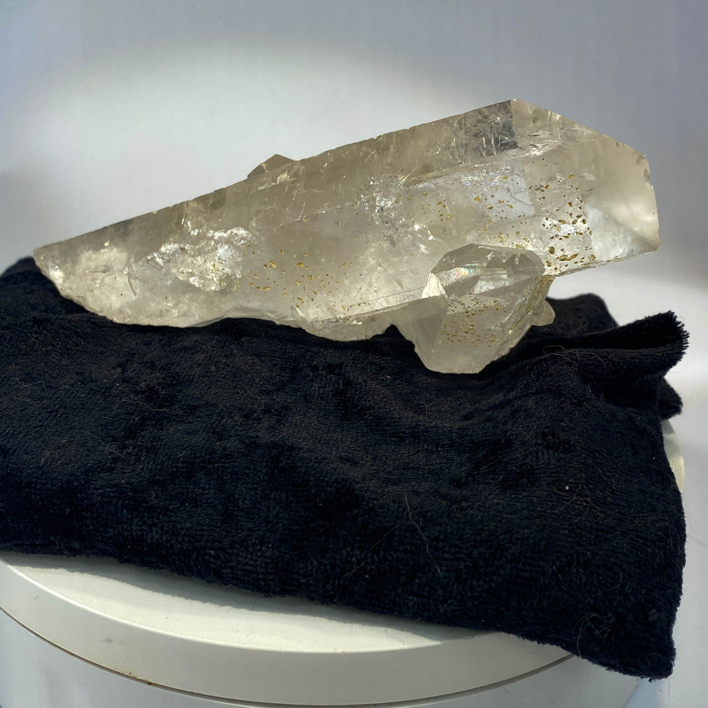 Waterclear quartz crystalline aggregate cluster on white background