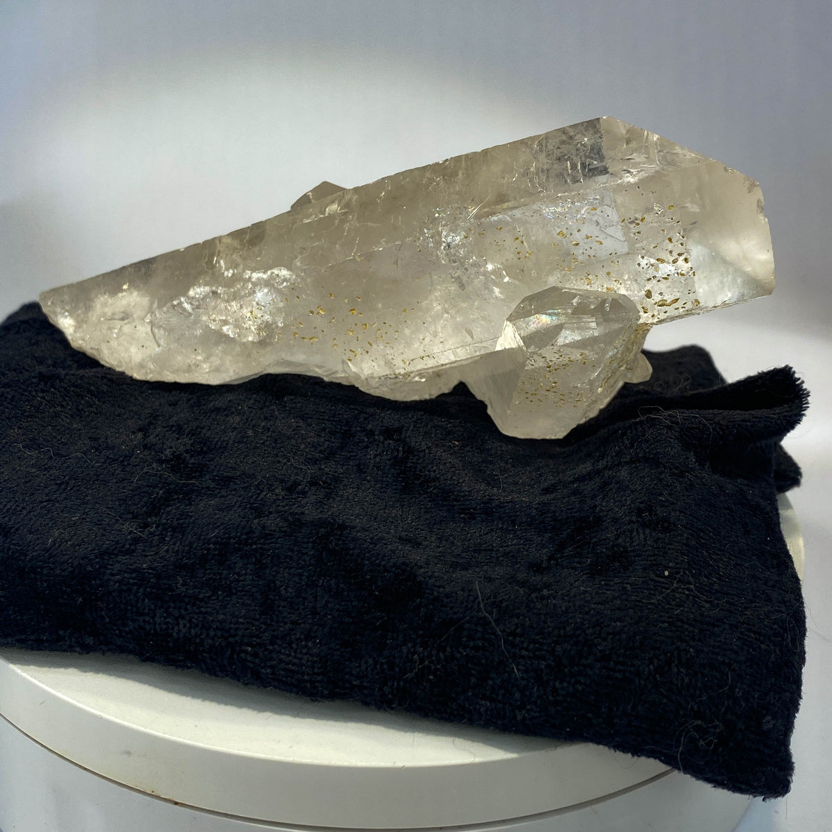 Waterclear quartz crystalline aggregate cluster on white background