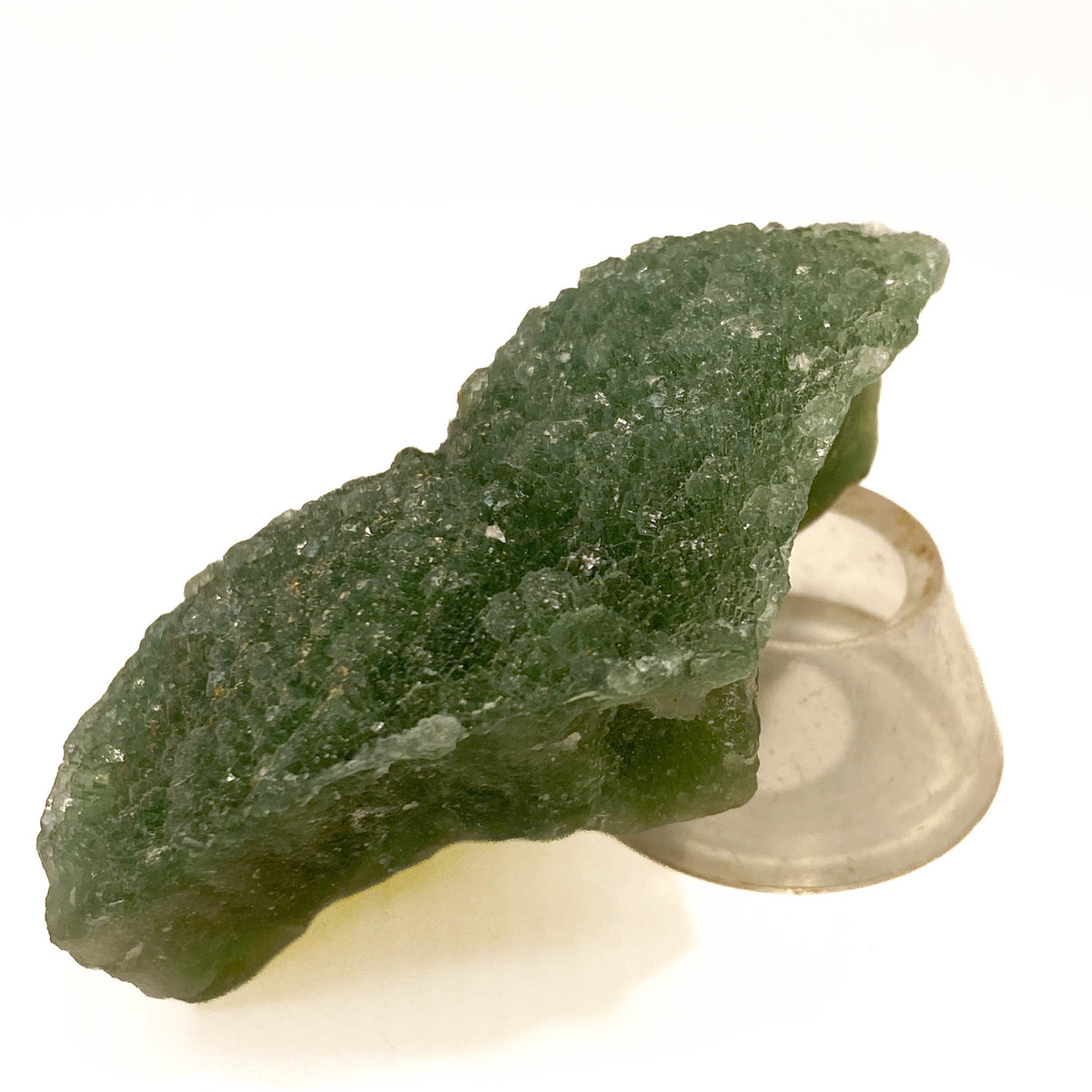 Botryoidal green fluorite specimen on white background