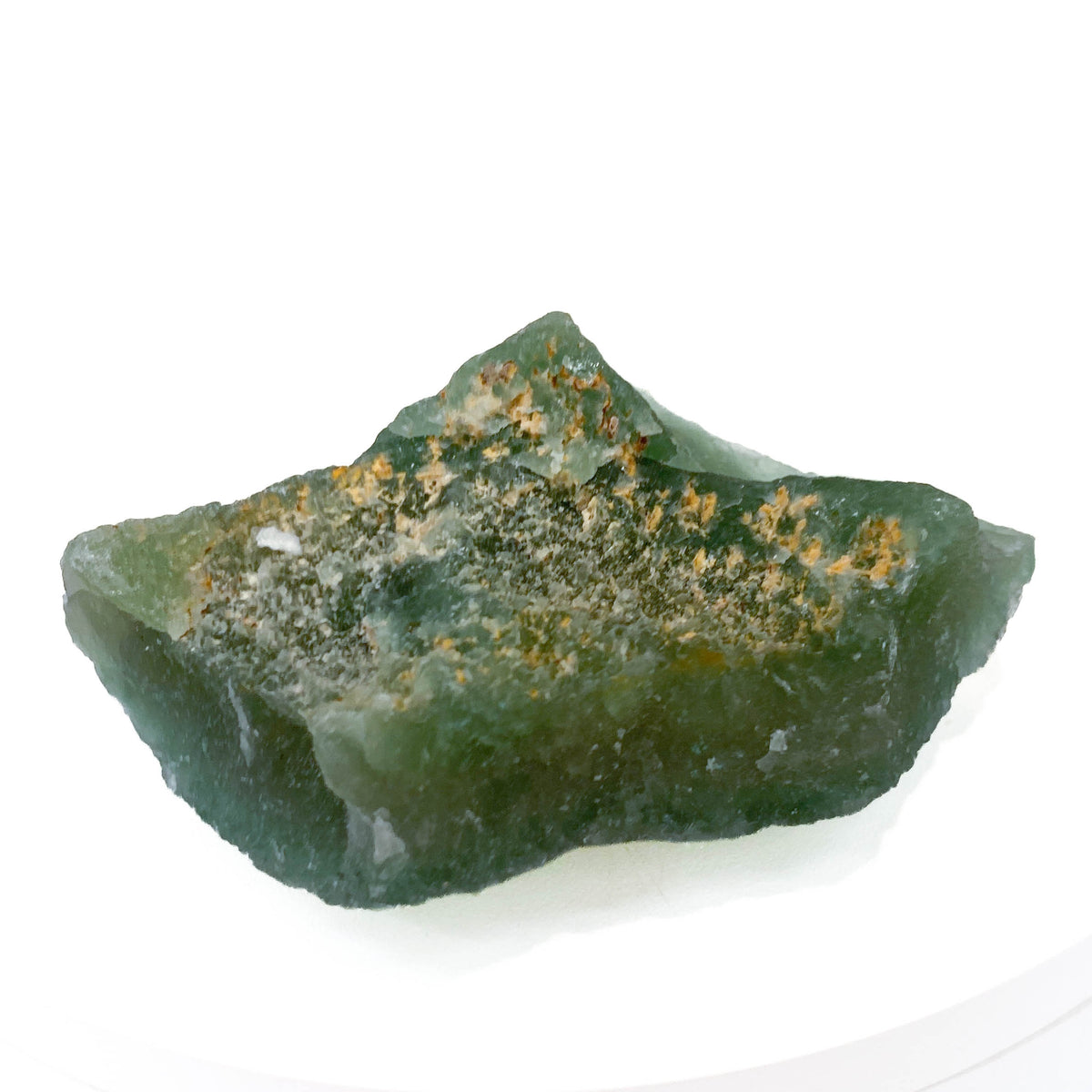 Botryoidal green fluorite specimen on white background