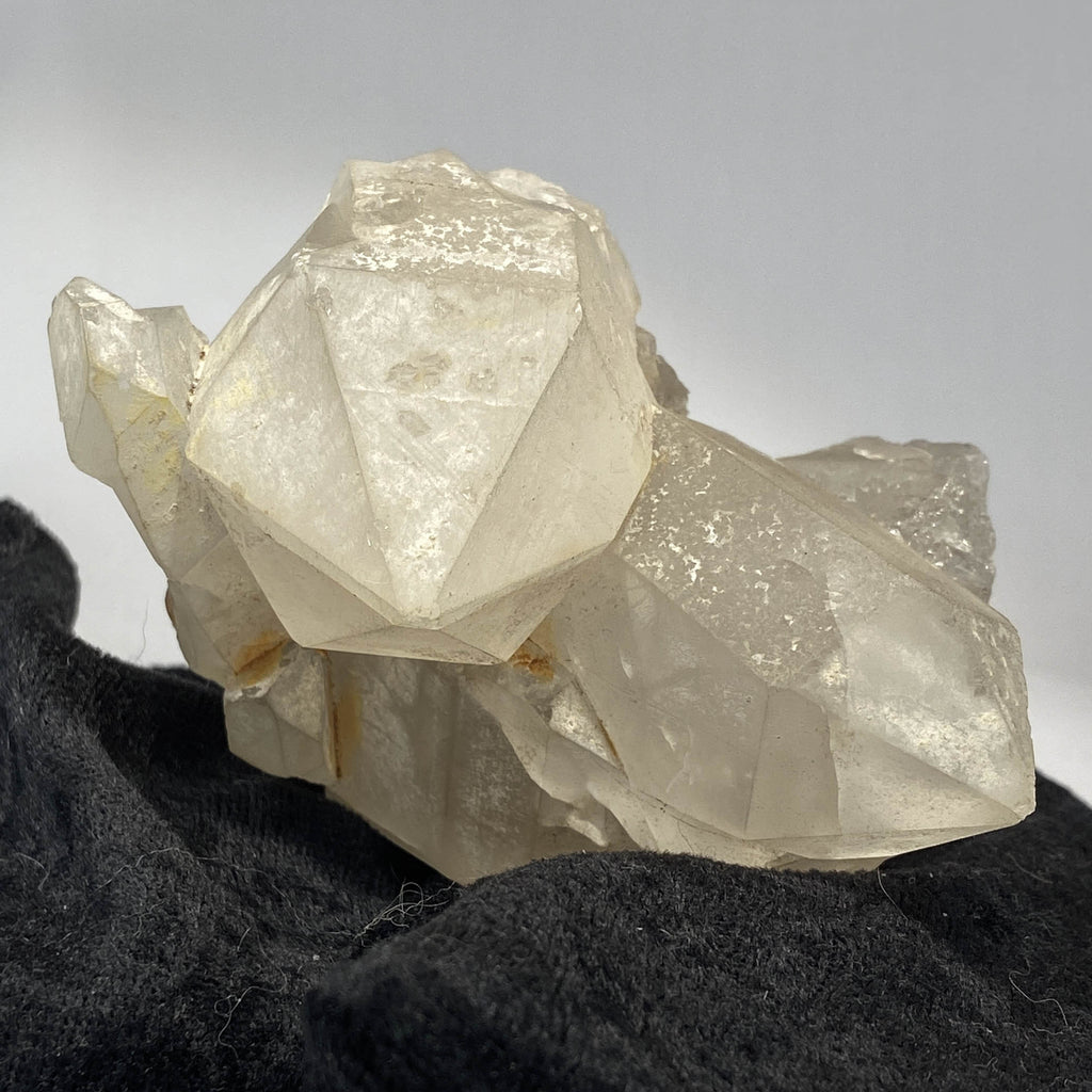 Mid-century Crater Lake Oregon quartz cluster on white background