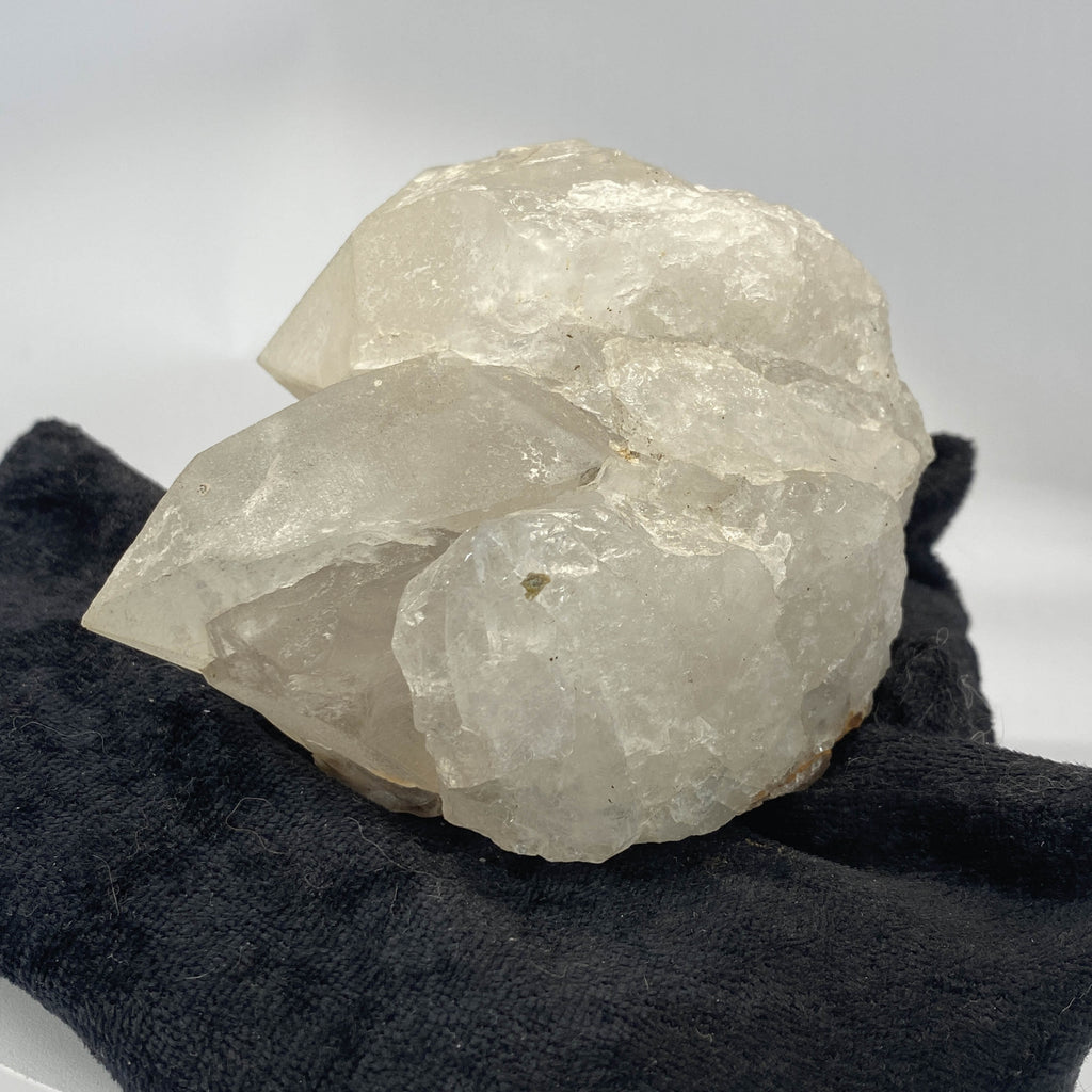 Mid-century Crater Lake Oregon quartz cluster on white background