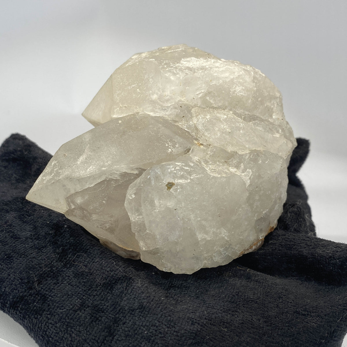 Mid-century Crater Lake Oregon quartz cluster on white background