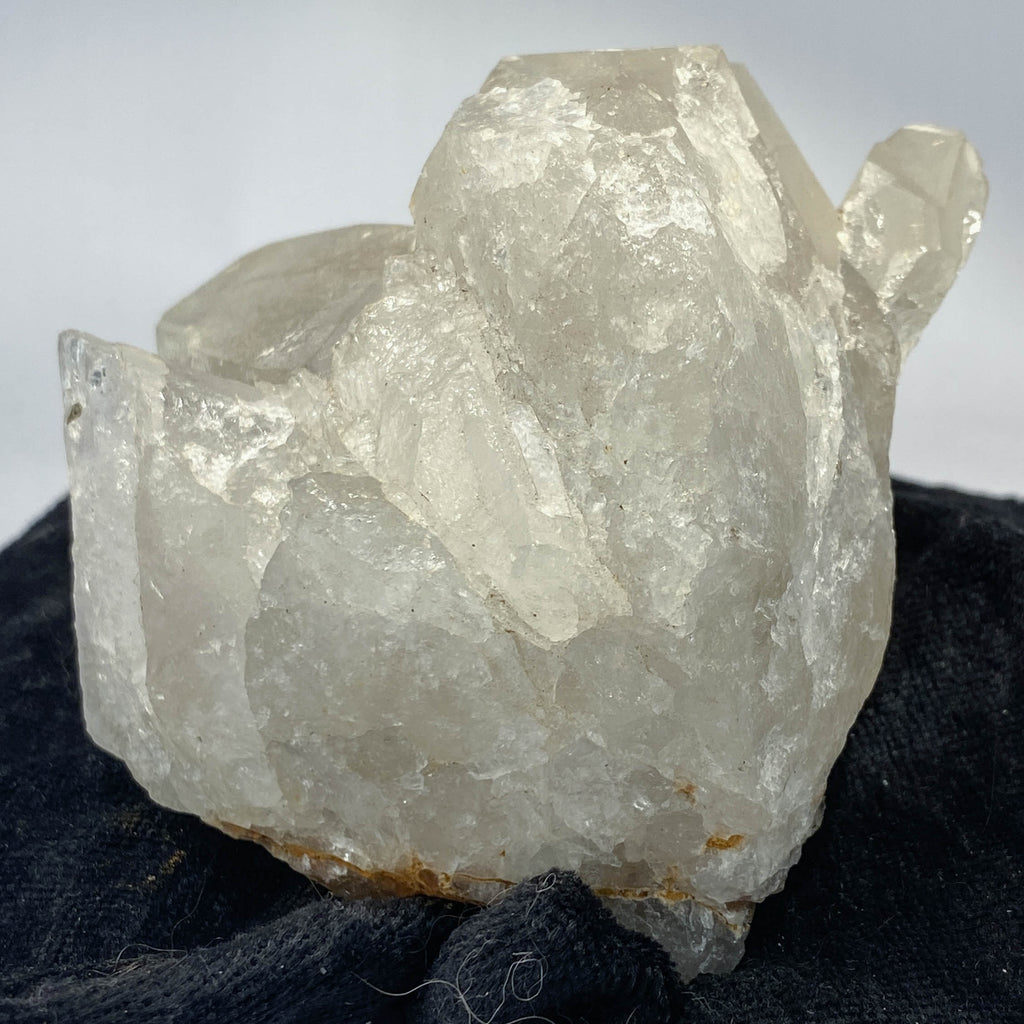 Mid-century Crater Lake Oregon quartz cluster on white background