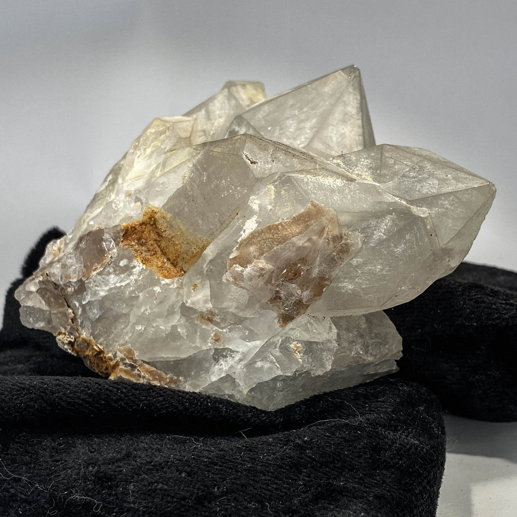Mid-century Crater Lake Oregon quartz cluster on white background