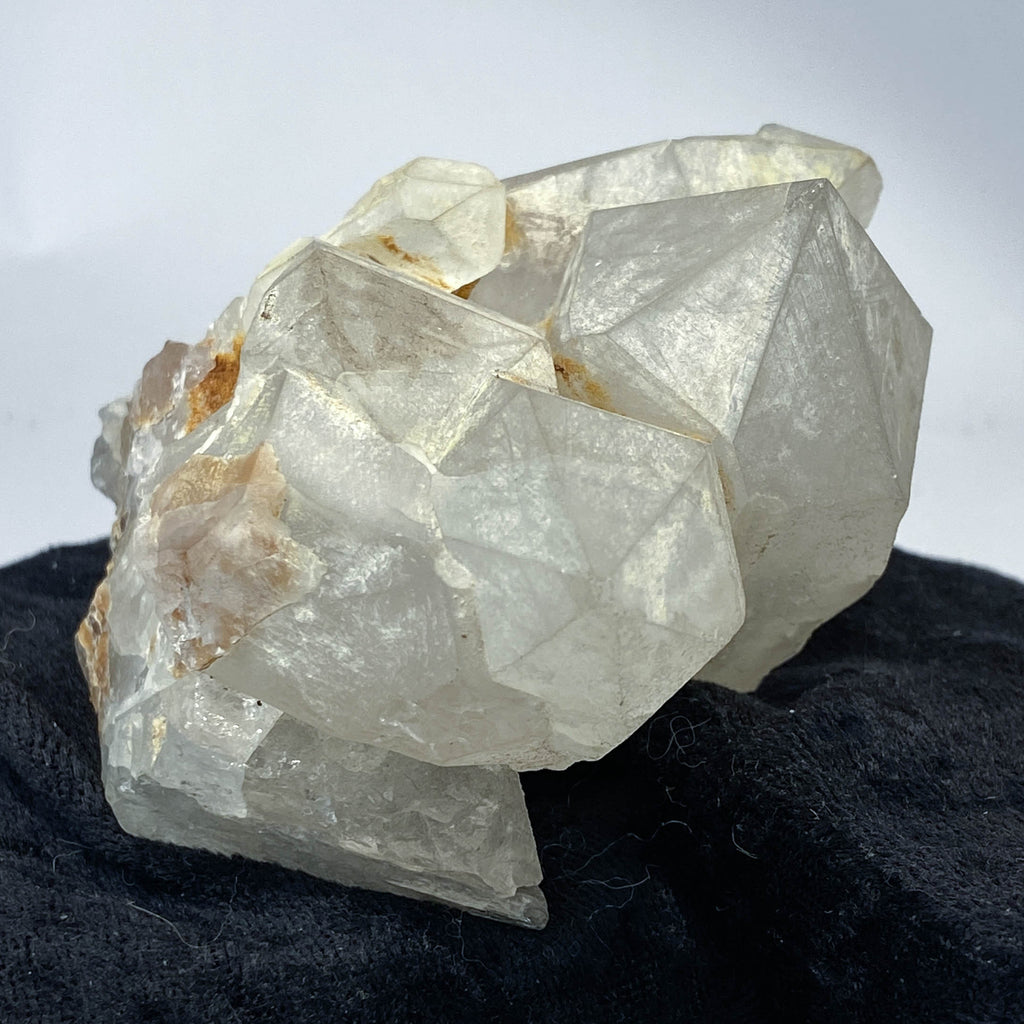 Mid-century Crater Lake Oregon quartz cluster on white background
